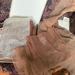 10 pair of vintage nylons with and without seems